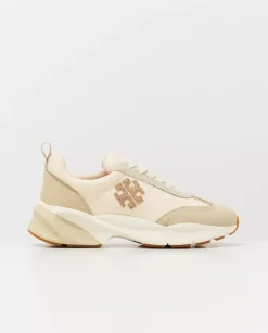 Beżowe sneakersy z emblematem Good Luck
