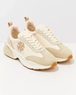 Beżowe sneakersy z emblematem Good Luck