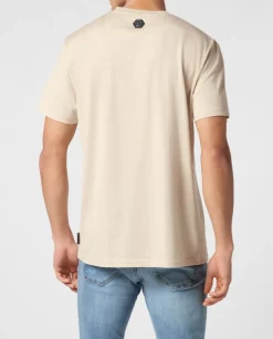 Beżowy t-shirt z geometrycznym logo