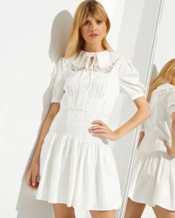 Biała rozkloszowana sukienka mini