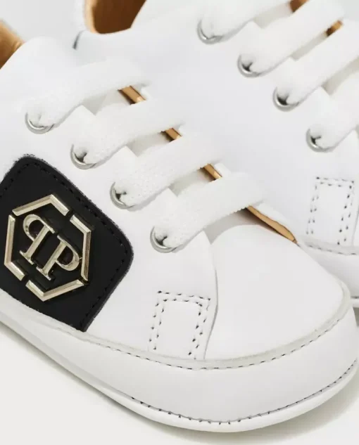 Białe sneakersy z logo 0-1 lat