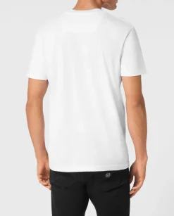 Biały bawełniany t-shirt z naszywkami