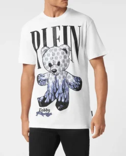 Biały t-shirt z ozdobnym misiem i logo