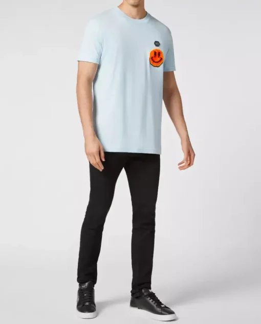 Błękitny t-shirt z naszywką Smile