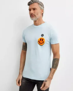 Błękitny t-shirt z naszywką Smile