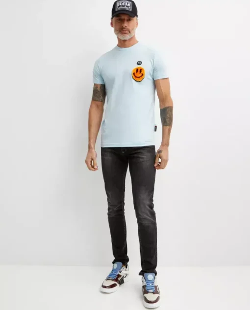 Błękitny t-shirt z naszywką Smile