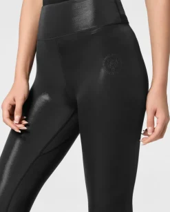 Błyszczące czarne legginsy