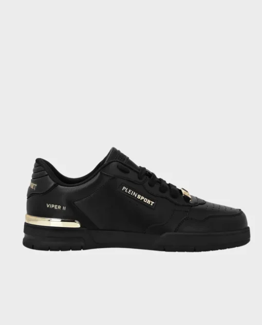 Czarne sneakersy ze złotymi detalami