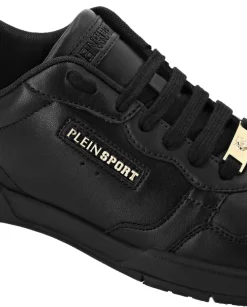Czarne sneakersy ze złotymi detalami