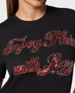 Czarny t-shirt z cekinowym napisem