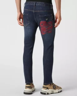 Granatowe jeansy z haftem Skull Skinny Fit