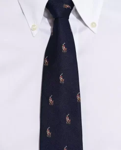 Granatowy jedwabny krawat z graczami polo