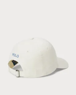 Kremowa czapka z daszkiem i logo