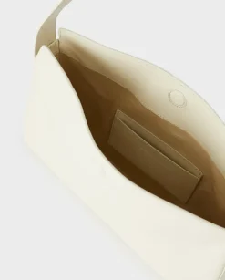 Kremowa torebka na ramię Soft Baguette