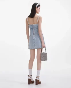 Niebieska jeansowa sukienka mini