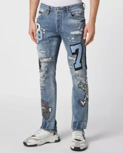 Niebieskie jeansy z naszywkami Super Straight