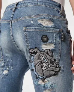 Niebieskie jeansy z naszywkami Super Straight