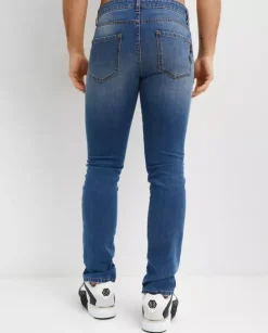 Niebieskie jeansy z naszywką Slim Fit