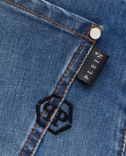 Niebieskie jeansy z naszywką Slim Fit