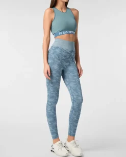 Niebieskie legginsy sportowe z printem