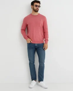 Różowy sweter z logo