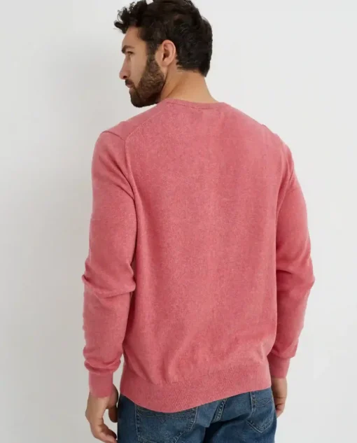 Różowy sweter z logo