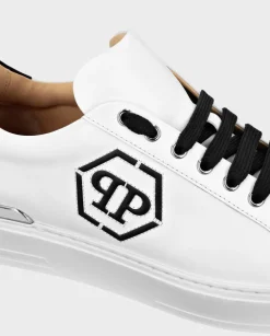 Skórzane białe sneakersy z logo
