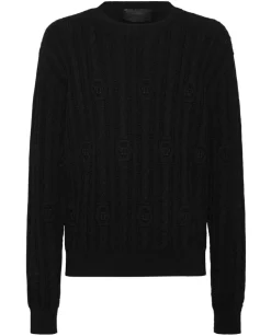 Sweter o warkoczowym splocie