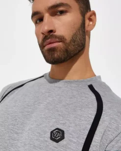 Szary t-shirt z czaszką na plecach