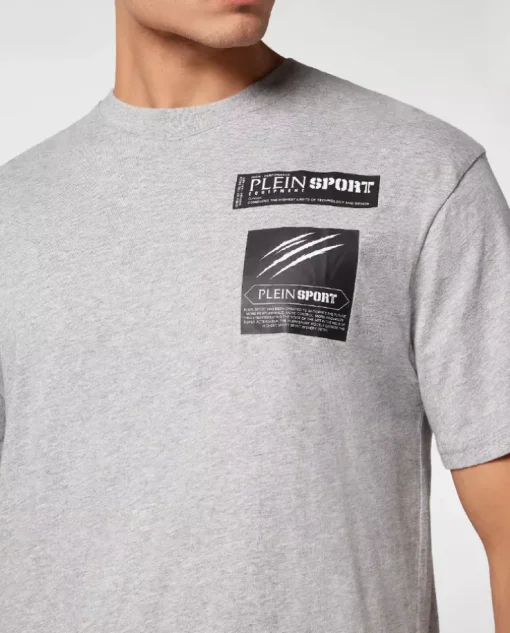 Szary t-shirt z naszywkami
