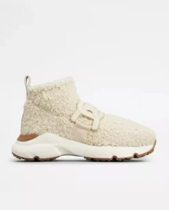 Wysokie kremowe sneakersy
