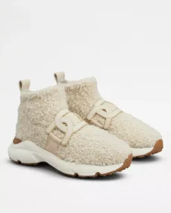 Wysokie kremowe sneakersy
